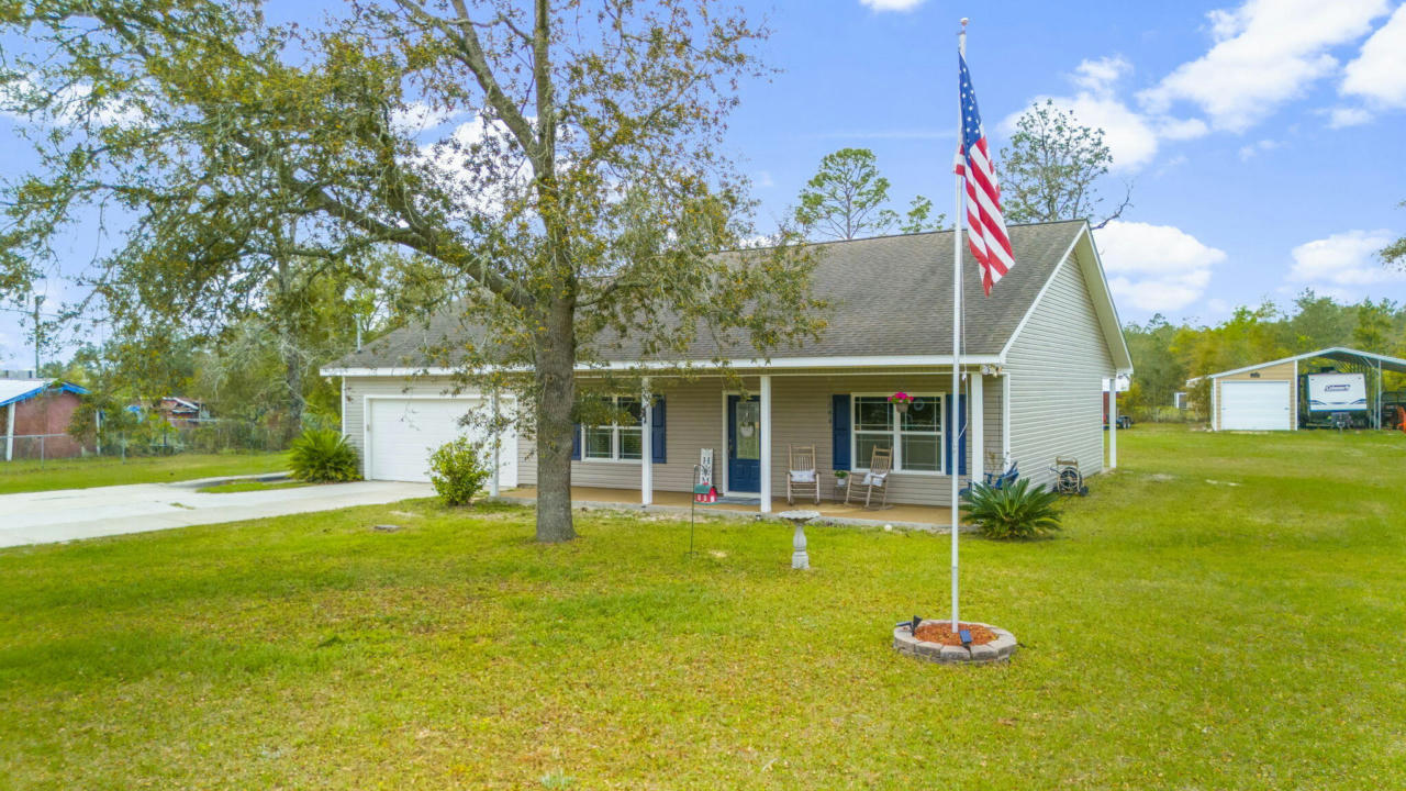 13633 FIDDLERS GREEN RD, SOUTHPORT, FL 32409, photo 1 of 44