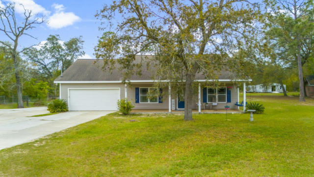 13633 FIDDLERS GREEN RD, SOUTHPORT, FL 32409, photo 2 of 44