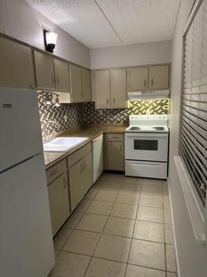209 W MIRACLE STRIP PKWY APT D304, MARY ESTHER, FL 32569 - Image 1